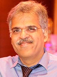 Dr. Manohar Shroff